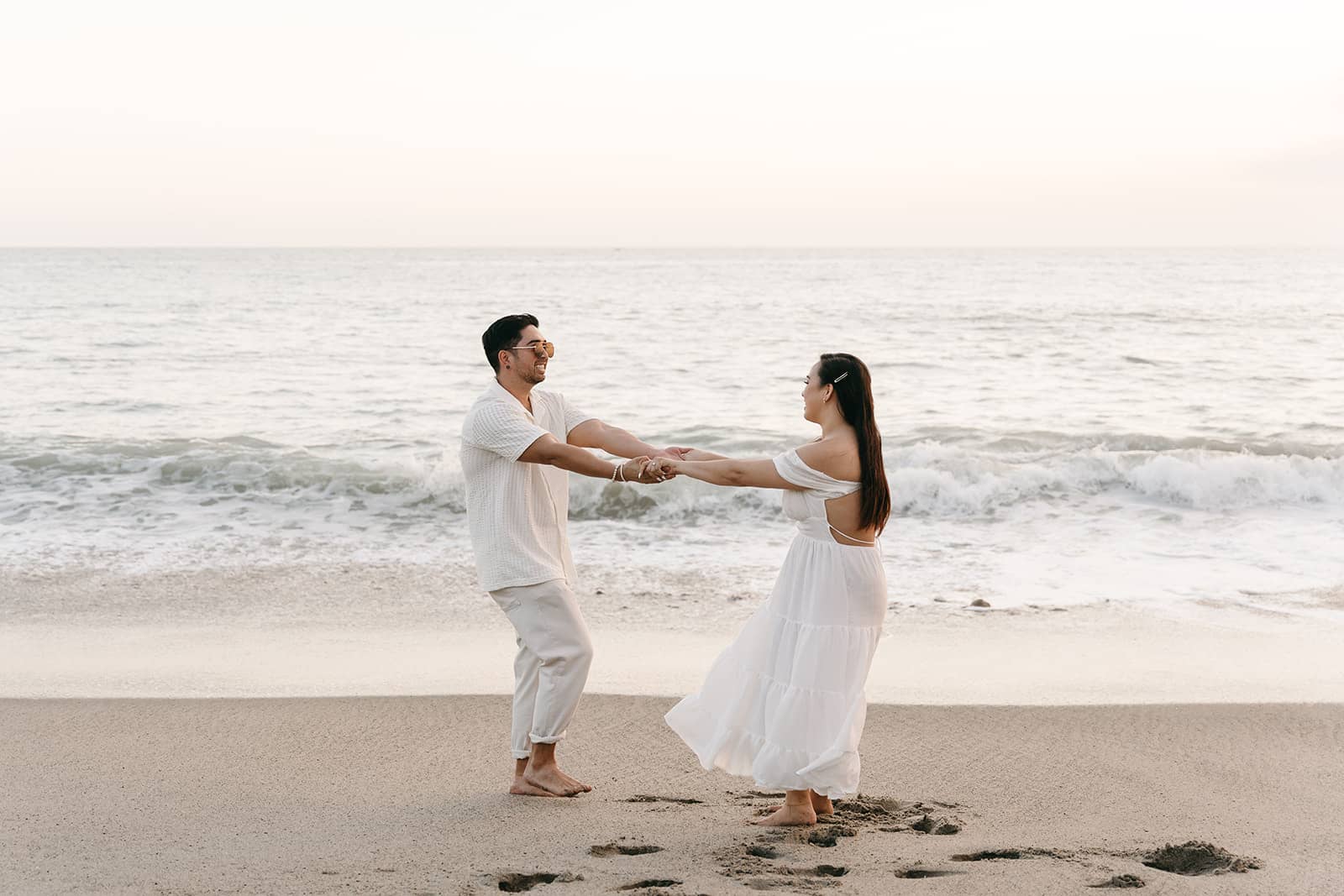 Check out Ashley + Marc's San Clementine Beach Engagement Session at Calafia Beach in California for engagement photo inspiration.